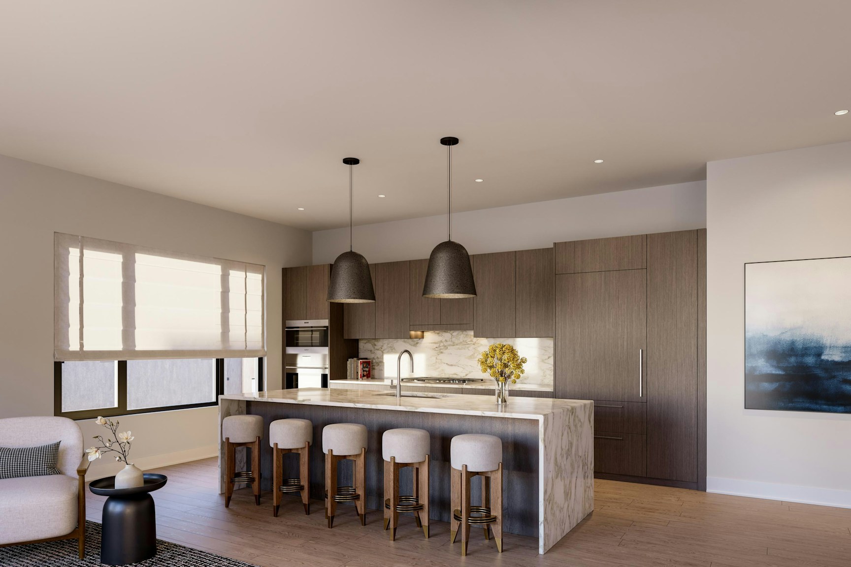 A modern kitchen with wood cabinetry, a marble island, and four cushioned stools. Pendant lights hang above the island, and a window lets in natural light. A cozy chair and side table are in the foreground.